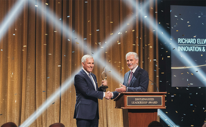 Richard Ellsworth being presented a professional certification